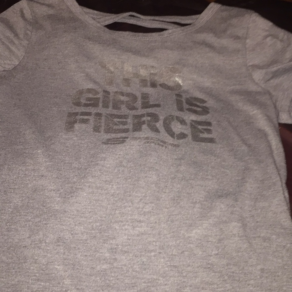A shirts that says “this girl is fierce”
